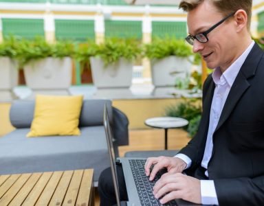 side-view-of-young-happy-caucasian-businessman-usi-2023-11-27-05-30-44-utc-Custom-1.jpg